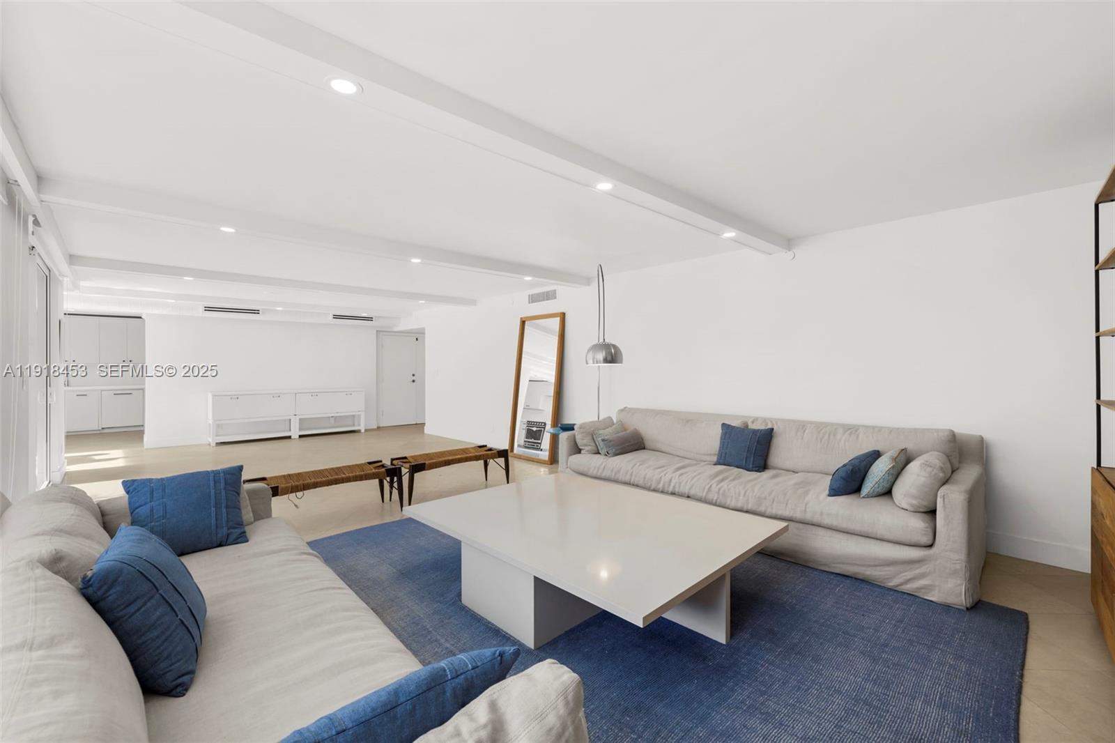 605 Ocean Drive, Unit 2L Key Biscayne, FL 33149 - Photo 8 of 46 a living room with furniture and wooden floor