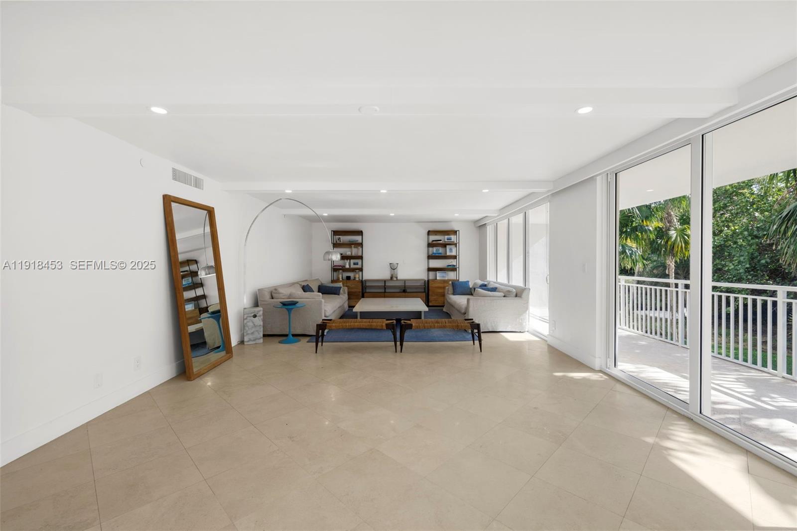 605 Ocean Drive, Unit 2L Key Biscayne, FL 33149 - Photo 10 of 46 LIVINGROOM OPENS TO SPACIOUS TERRACE