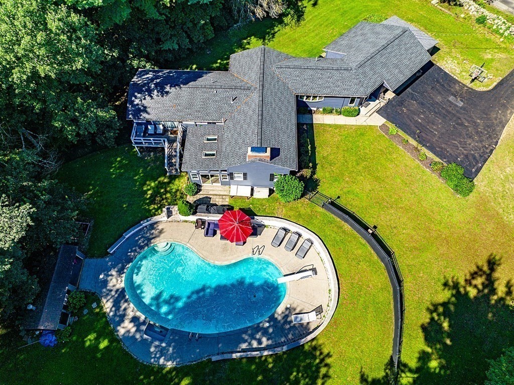 69 Aberdeen Road Weston, MA 02493 - Photo 1 of 30 an aerial view of a house with swimming pool and garden