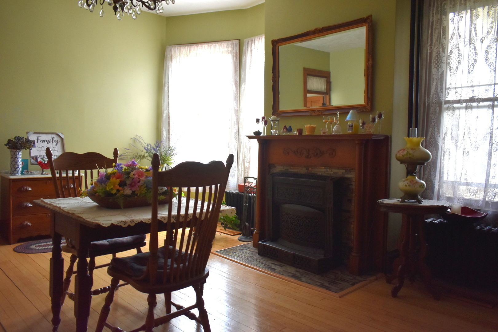 330 East Locust Street Watseka, IL 60970 - Photo 17 of 72 a view of a dining room with furniture and a fireplace