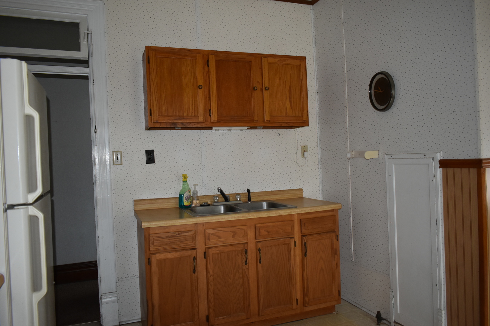 330 East Locust Street Watseka, IL 60970 - Photo 36 of 72 a room with cabinets and a wooden floor