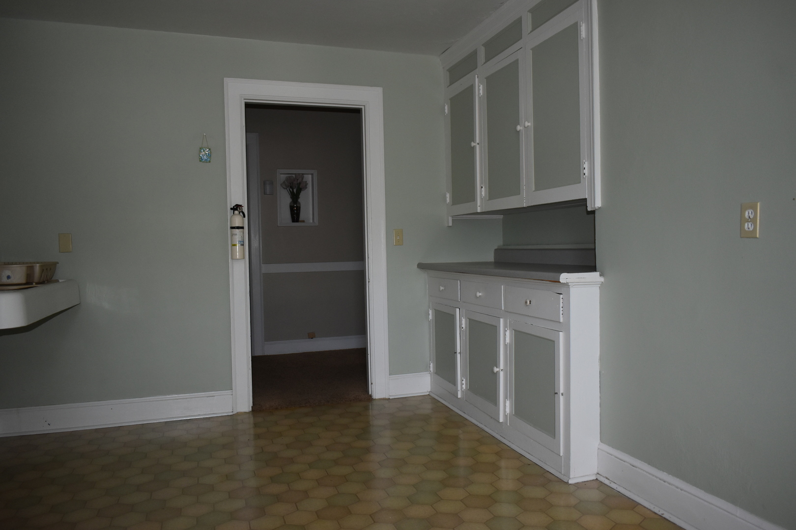 330 East Locust Street Watseka, IL 60970 - Photo 44 of 72 a view of a kitchen with a sink and cabinets