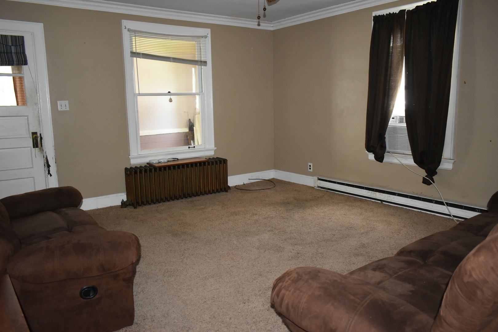 330 East Locust Street Watseka, IL 60970 - Photo 49 of 72 a living room with furniture and a window