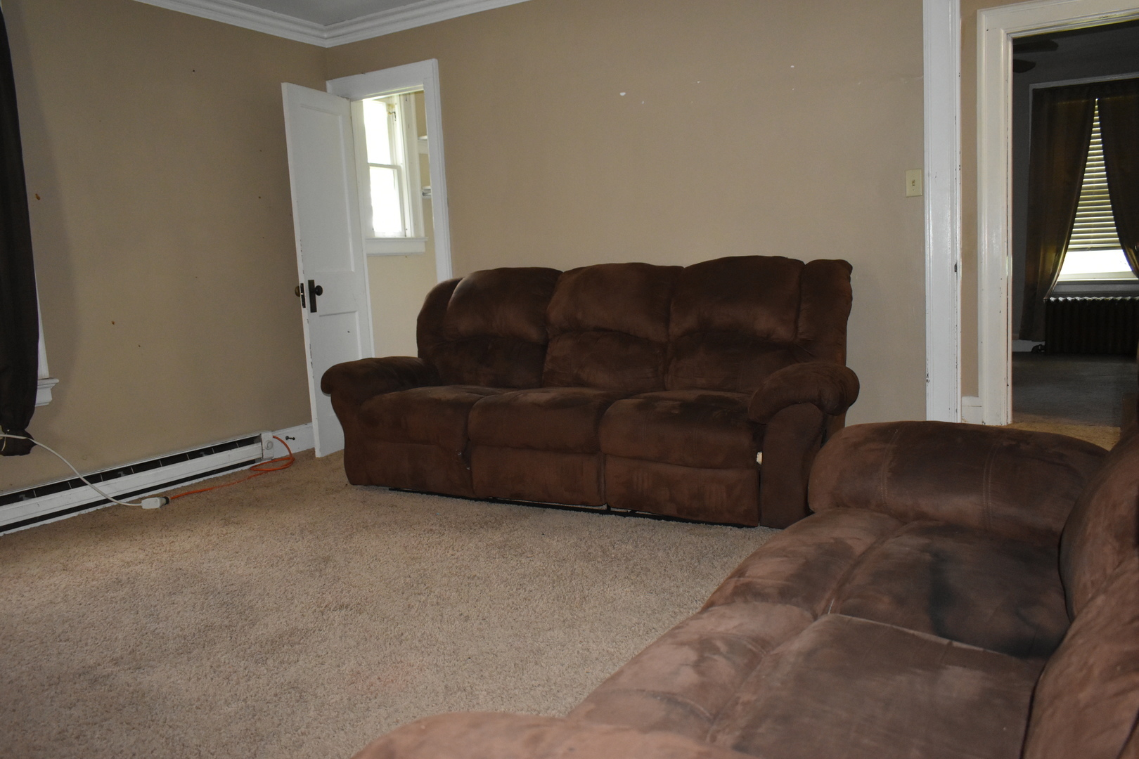 330 East Locust Street Watseka, IL 60970 - Photo 50 of 72 a living room with couches and a flat screen tv