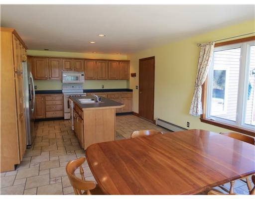 259 River Road Limington, ME 04049 - Photo 14 of 25 Kitchen. Behind table is slider to...