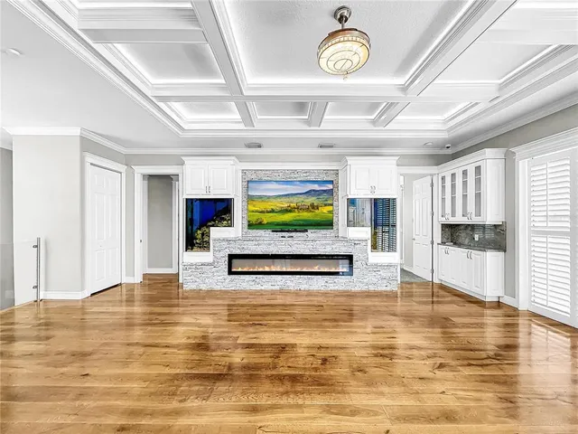 a kitchen with a sink and a potted plant
