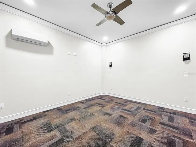 a bathroom with a granite countertop sink a toilet and bathtub