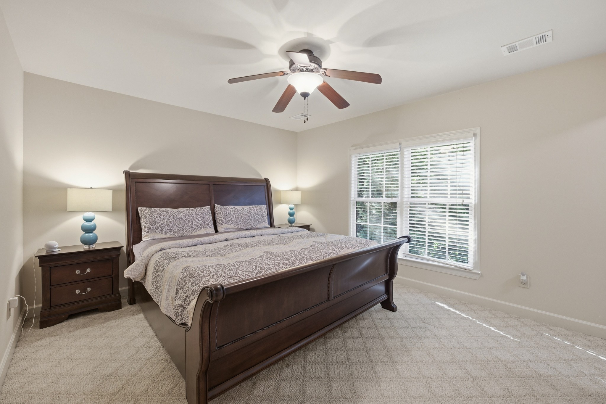 319 Hamlets End Way Franklin, TN 37067 - Photo 37 of 54 a bedroom with a bed and window