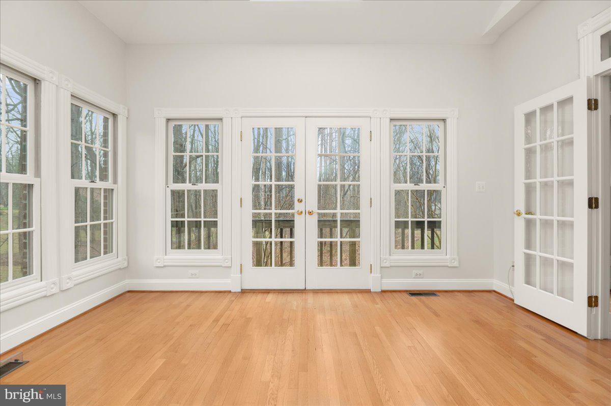 13635 Maidstone Lane Potomac, MD 20854 - Photo 16 of 66 Windows galore and french doors to back