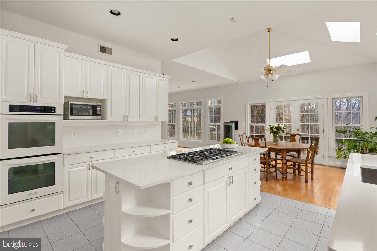 13635 Maidstone Lane Potomac, MD 20854 - Photo 21 of 66 Updated kitchen - white cabinets, carerra quartz