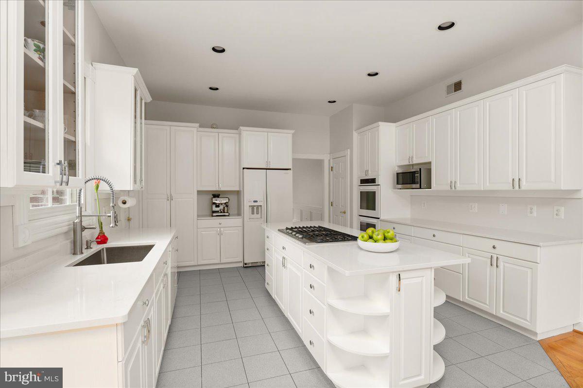 13635 Maidstone Lane Potomac, MD 20854 - Photo 23 of 66 Great countertop spaces and a lot of cabinet space
