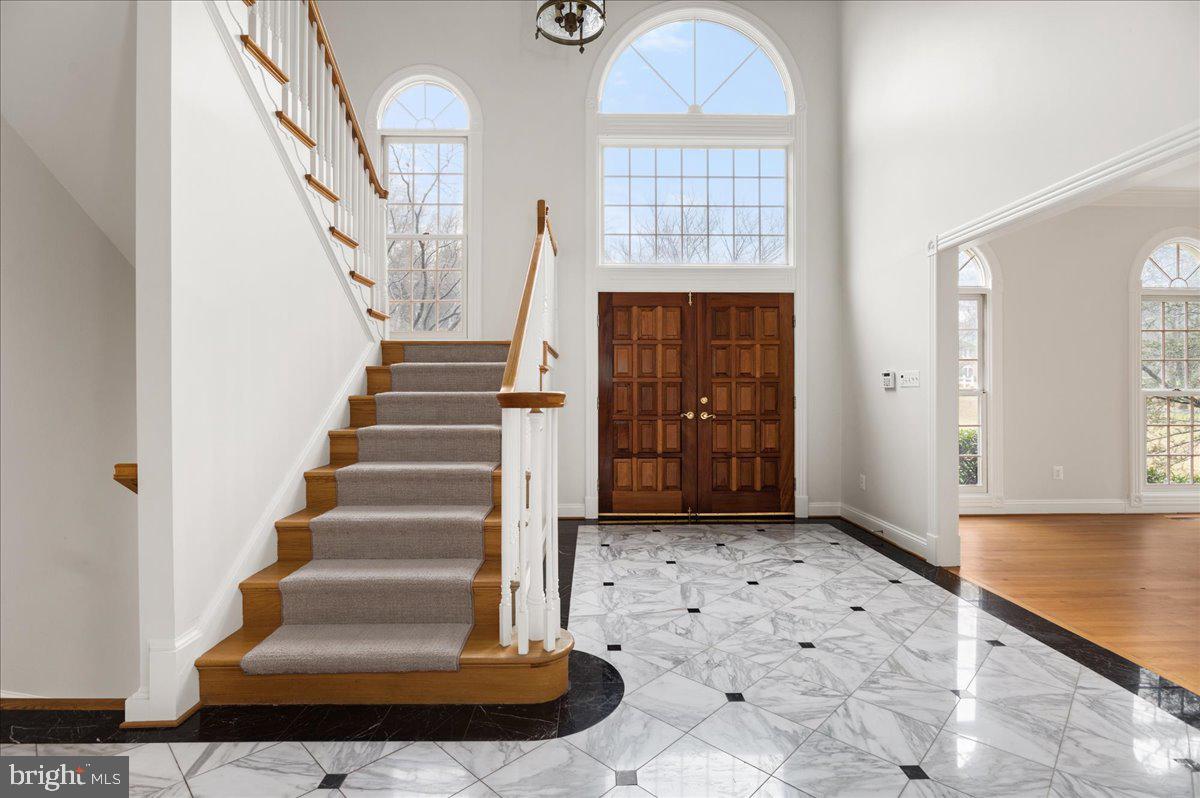 13635 Maidstone Lane Potomac, MD 20854 - Photo 4 of 66 Bright foyer with marble flooring, wide stairwell