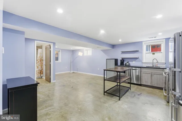 a view of yard with swimming pool and green space