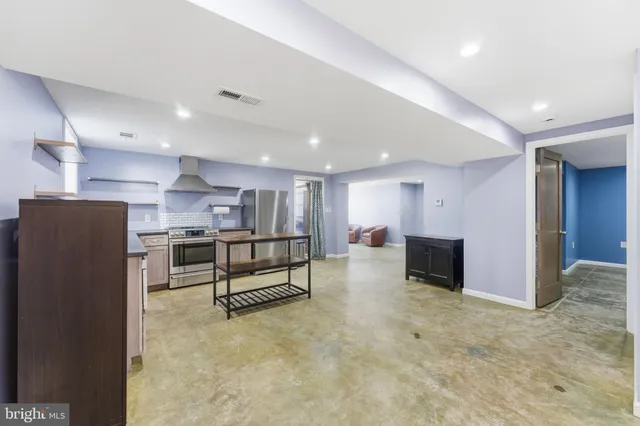 a view of a lake with houses in the back