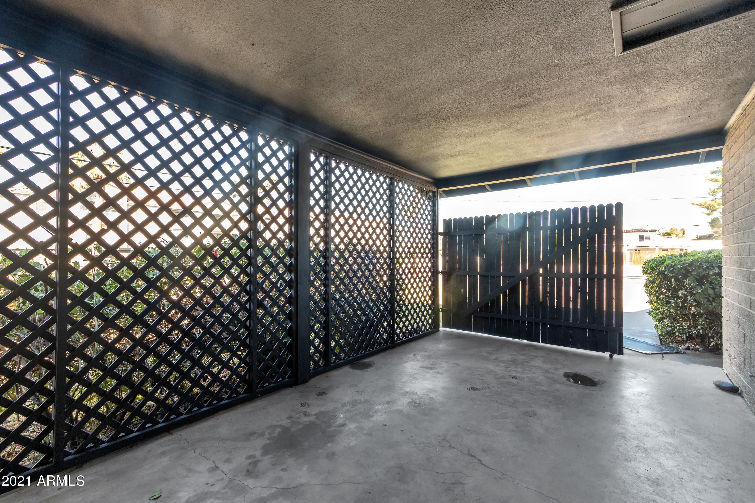 4417 North 21st Street Phoenix, AZ 85016 - Photo 13 of 18 a view of a black gate