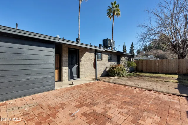 a view of a backyard of a house