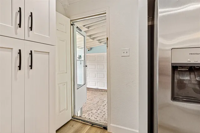 a view of a bathroom with a glass door