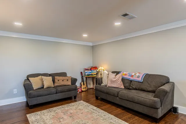a living room with furniture and a couch