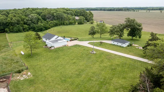 a view of a lake with a yard