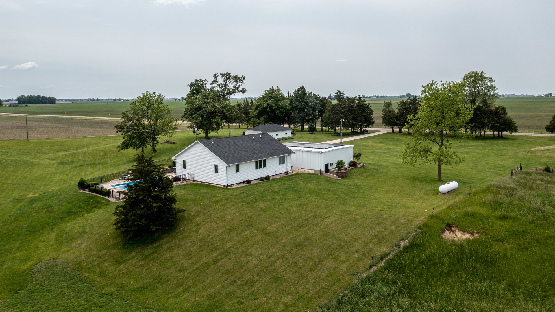 3980 East 4th Road Mendota, IL 61342 - Photo 43 of 44 a view of a lake with a house in the background