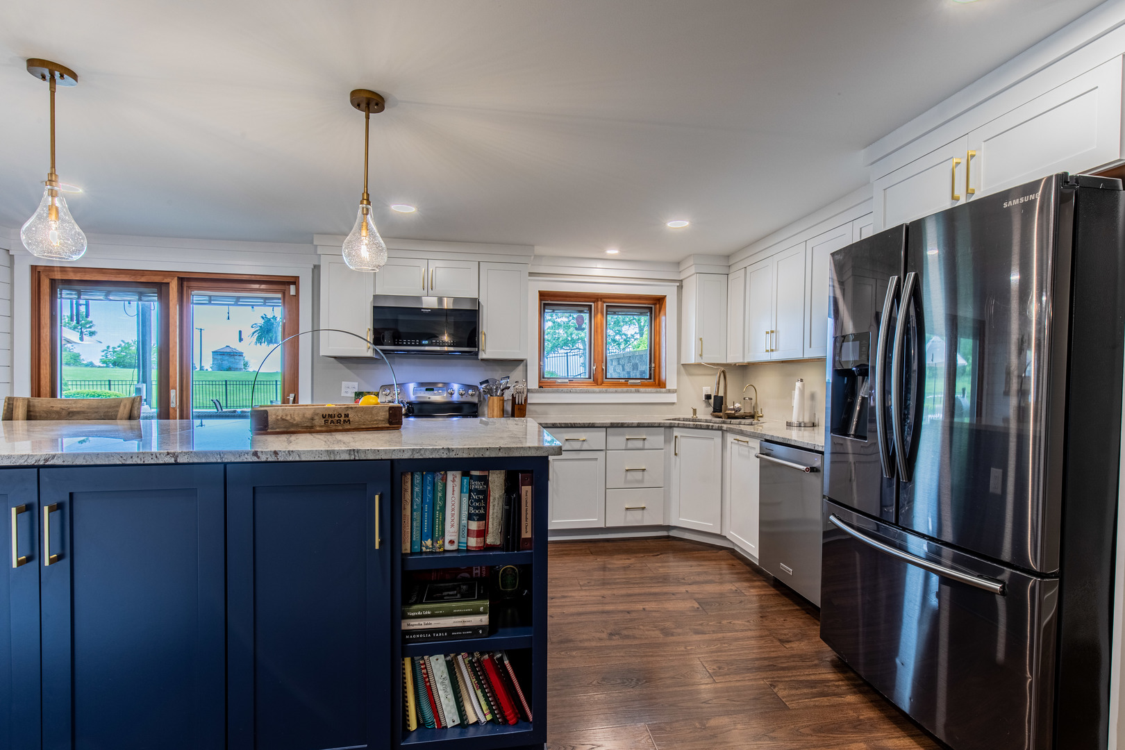 3980 East 4th Road Mendota, IL 61342 - Photo 6 of 44 a kitchen with refrigerator a stove and cabinets