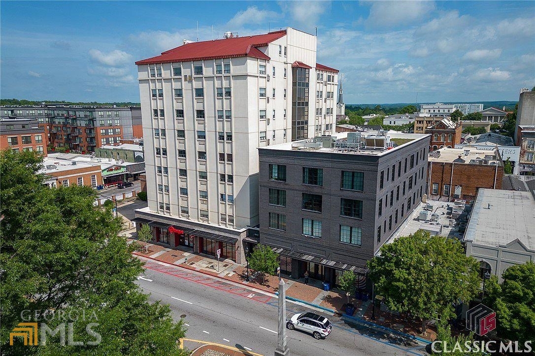 131 East Broad Street, Unit 903 Athens, GA 30601 - Photo 1 of 1 a view of a building with a yard