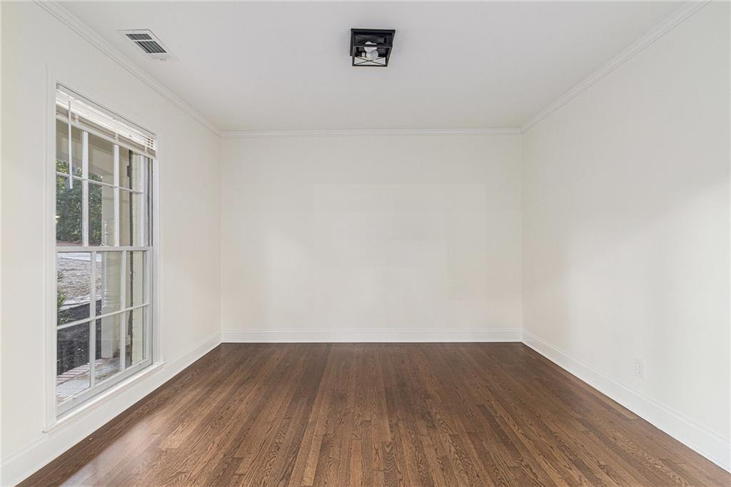 1110 Upper Hembree Road Roswell, GA 30076 - Photo 19 of 51 a view of a small space with wooden floor and a window