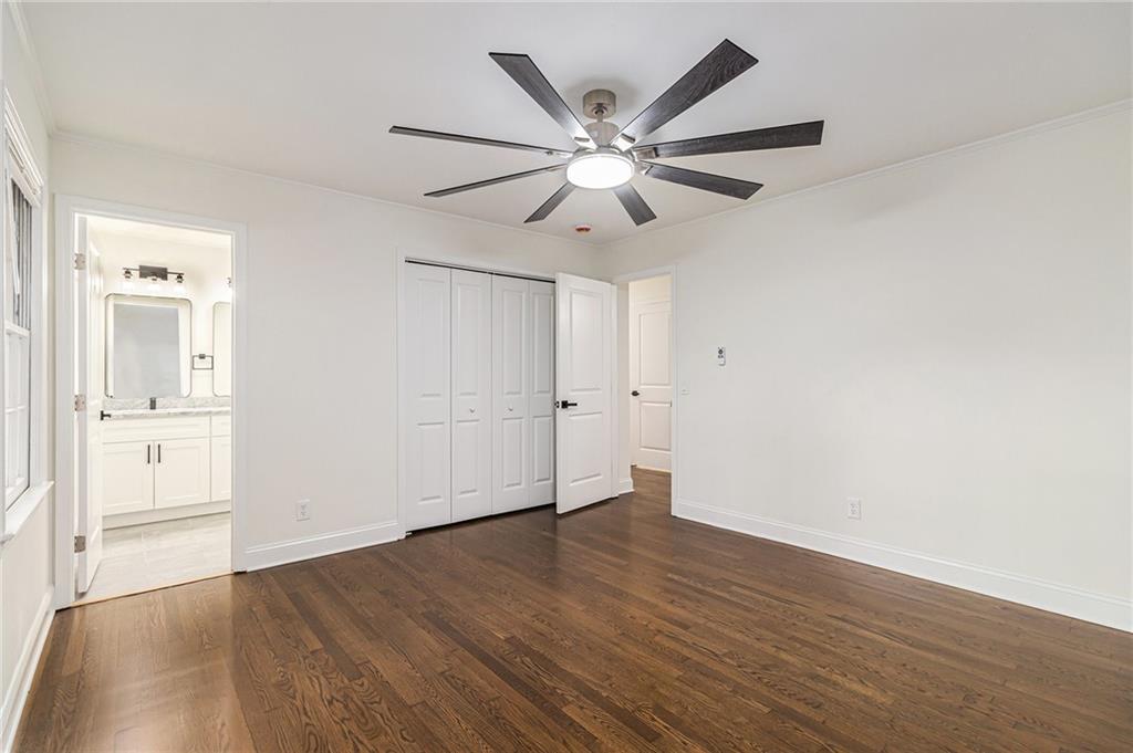 1110 Upper Hembree Road Roswell, GA 30076 - Photo 21 of 51 a view of an empty room with wooden floor