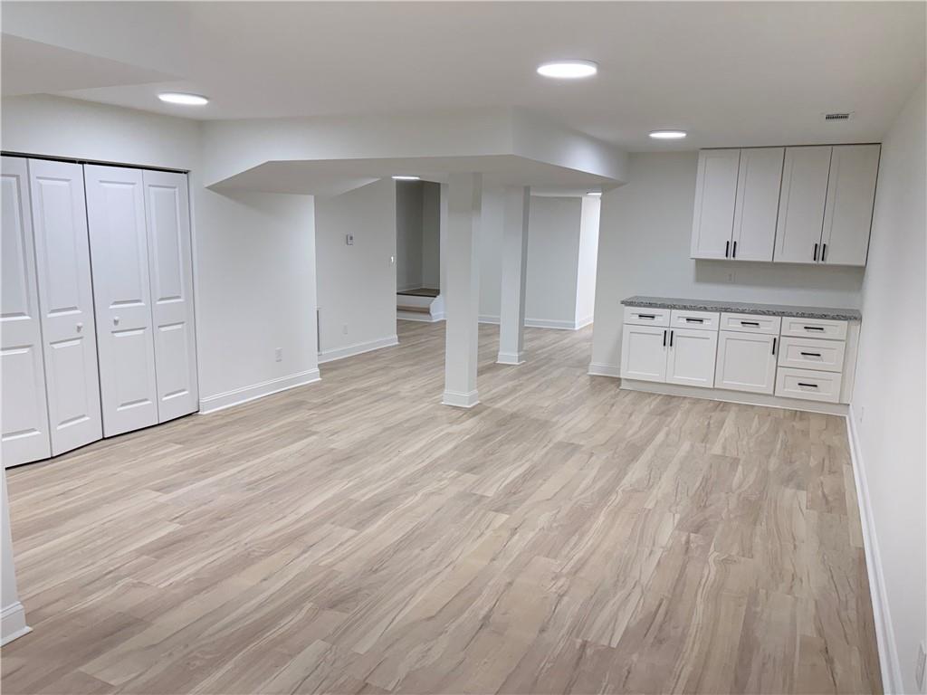 1110 Upper Hembree Road Roswell, GA 30076 - Photo 29 of 51 a view of a kitchen with wooden floor