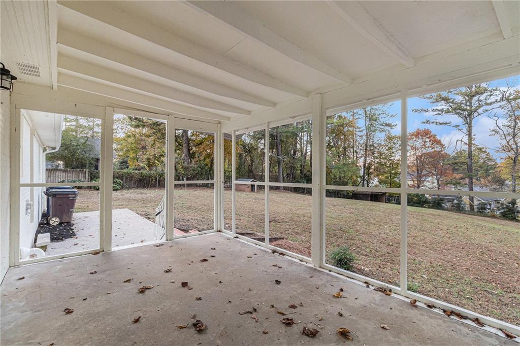 1110 Upper Hembree Road Roswell, GA 30076 - Photo 40 of 51 a house with a large window and yard