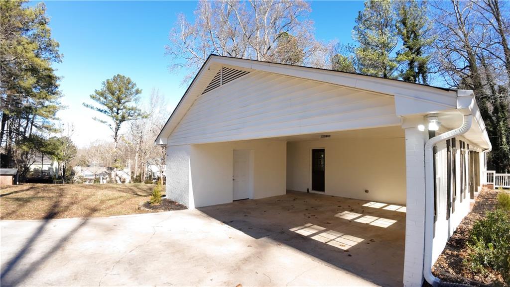 1110 Upper Hembree Road Roswell, GA 30076 - Photo 6 of 51 a view of a house with a yard