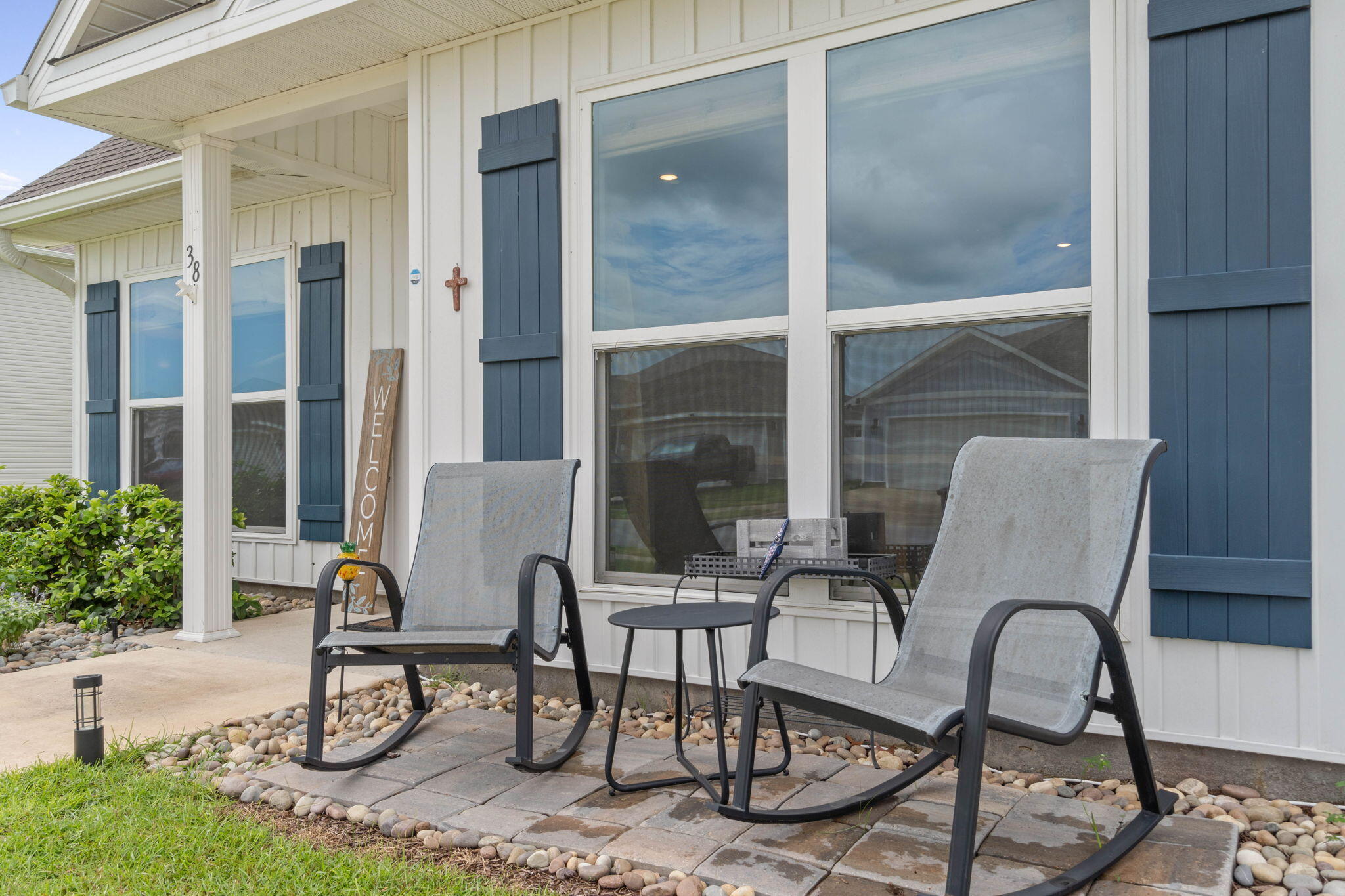 38 Silverthorn Street Freeport, FL 32439 - Photo 6 of 42 a view of a dinning room with chairs and table in a patio