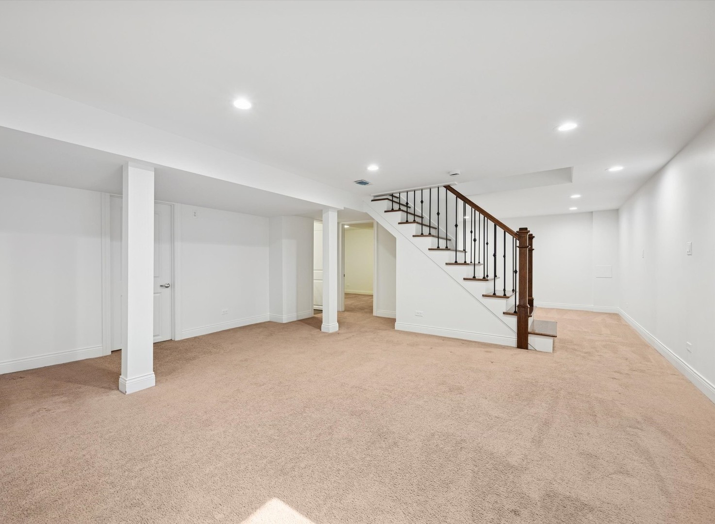 716 Indian Road Glenview, IL 60025 - Photo 22 of 32 a view of an empty room with stairs