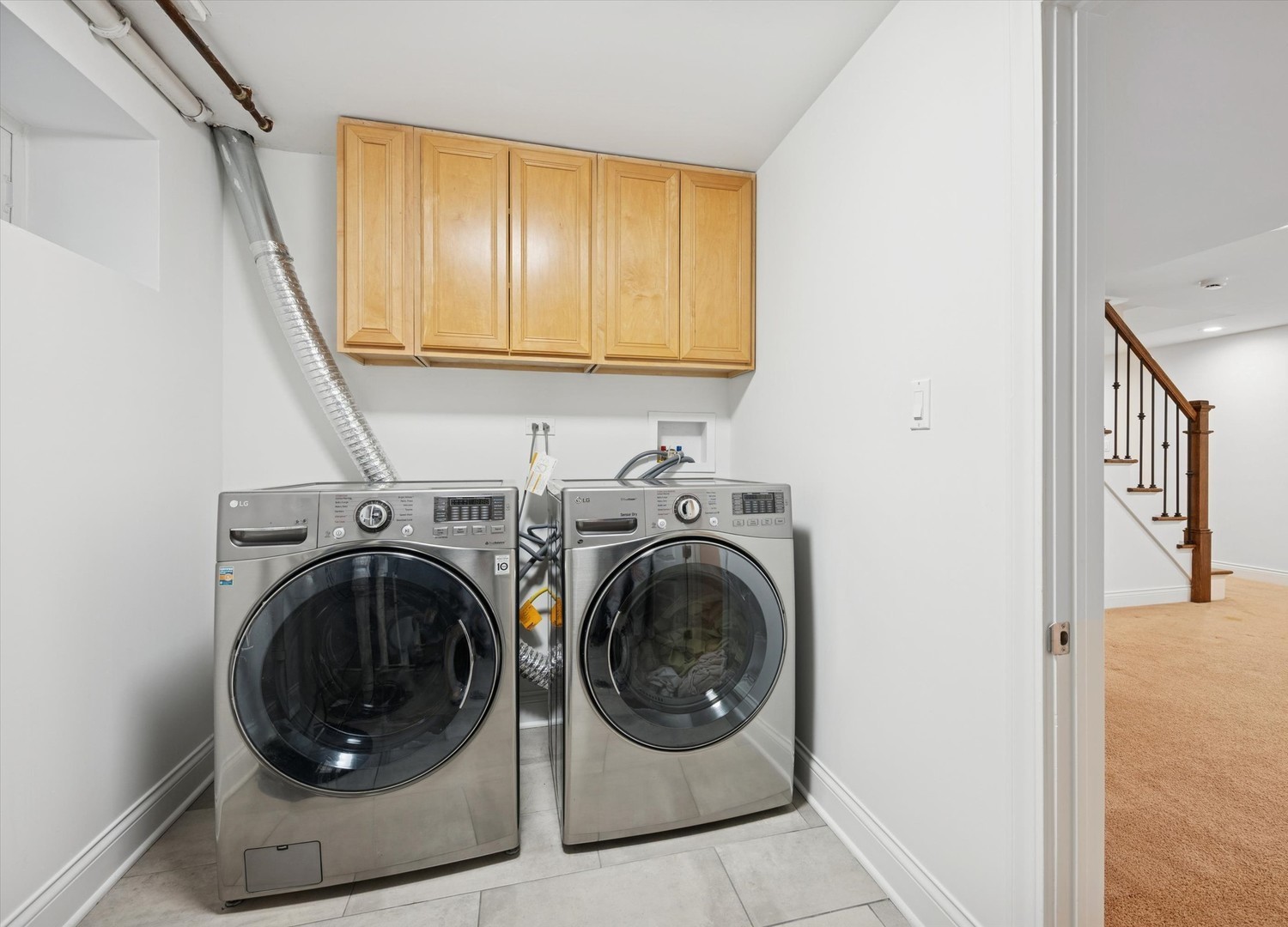 716 Indian Road Glenview, IL 60025 - Photo 26 of 32 a utility room with dryer and washer