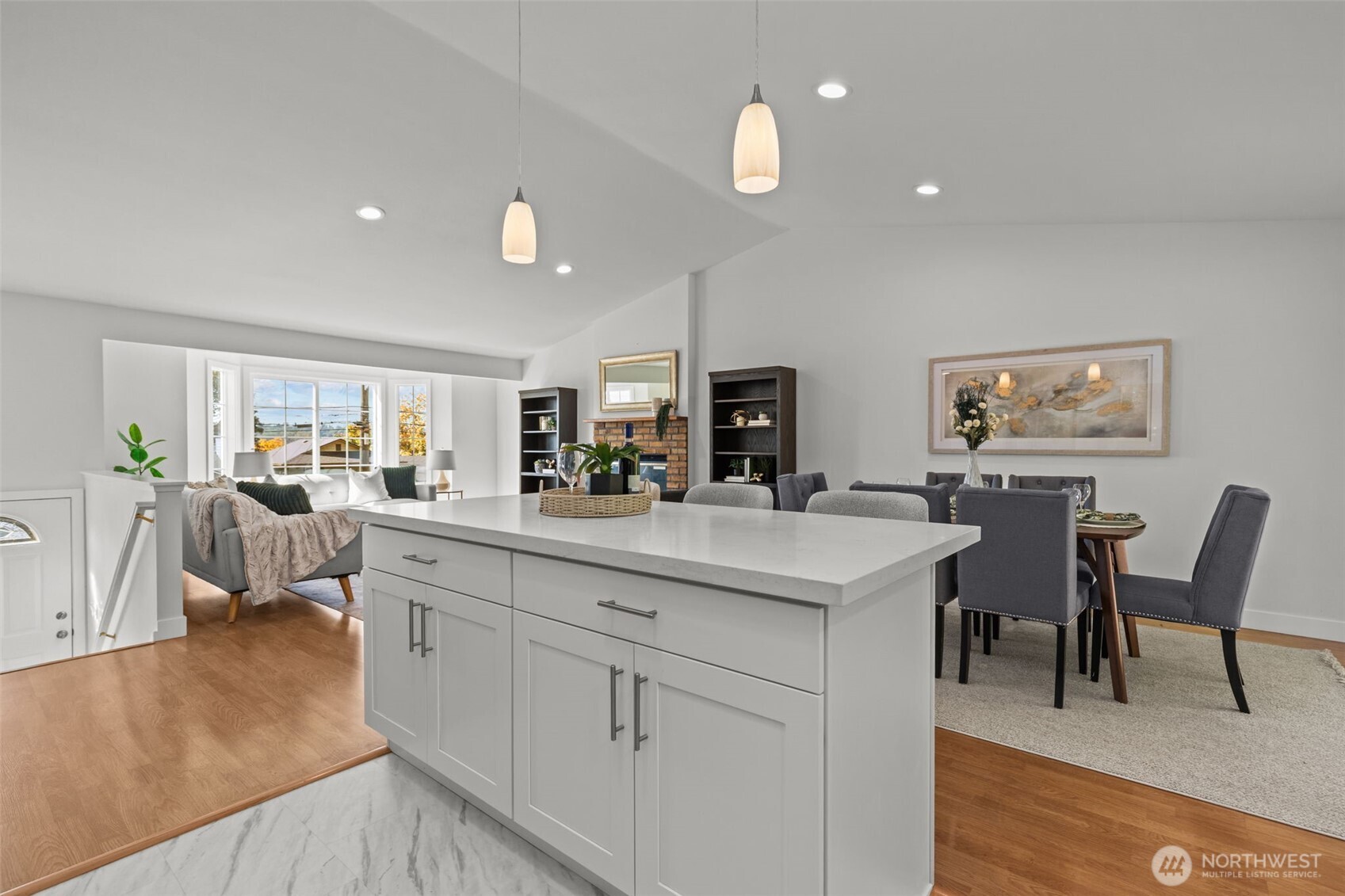 11822 56th Place South Seattle, WA 98178 - Photo 11 of 39 a living room with furniture and a dining table with wooden floor