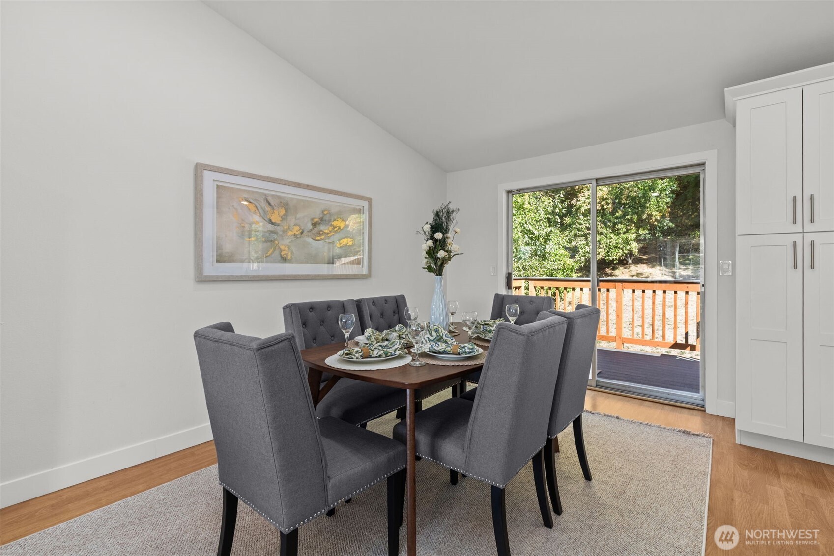 11822 56th Place South Seattle, WA 98178 - Photo 16 of 39 a dining room with furniture a rug and wooden floor