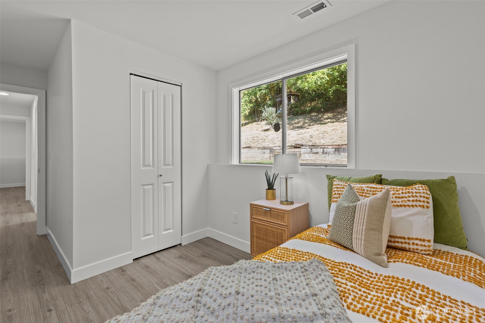 11822 56th Place South Seattle, WA 98178 - Photo 28 of 39 a bedroom with furniture and a window