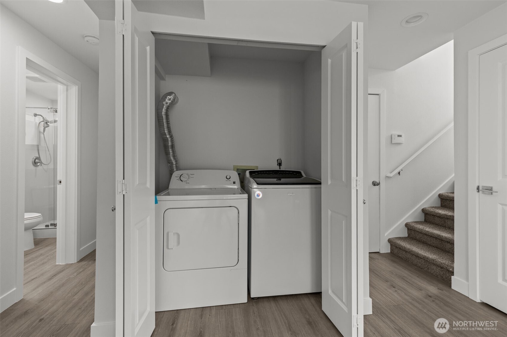 11822 56th Place South Seattle, WA 98178 - Photo 35 of 39 a view of a storage and utility room with washer and dryer