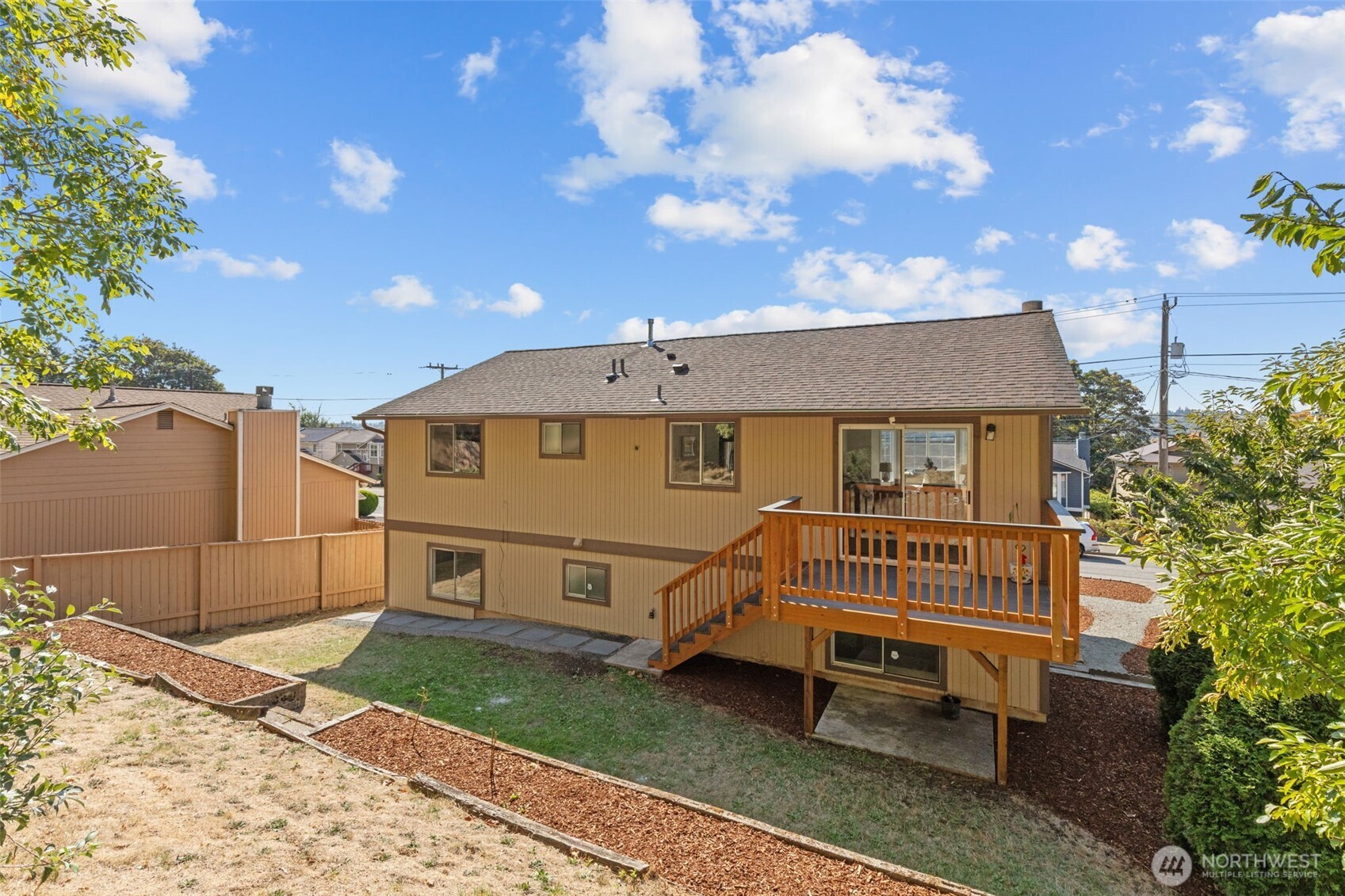 11822 56th Place South Seattle, WA 98178 - Photo 38 of 39 a view of a house with a yard