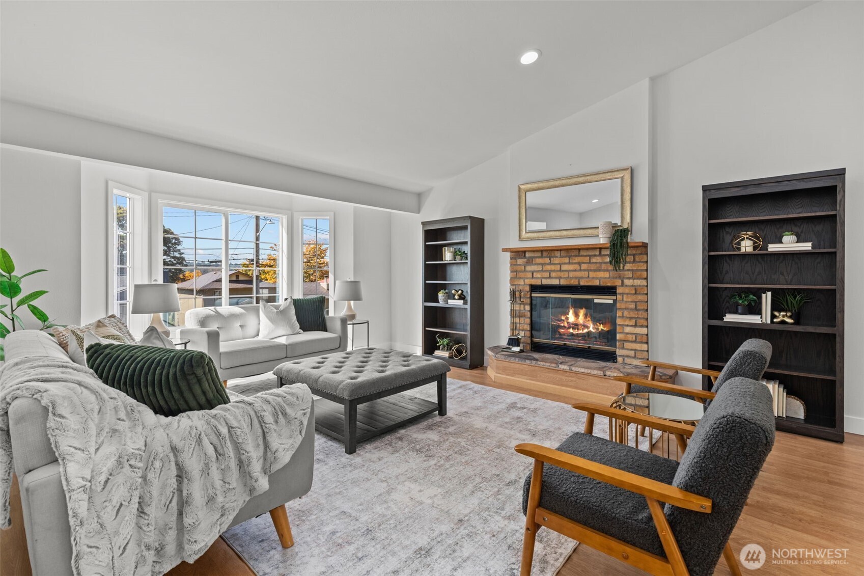 11822 56th Place South Seattle, WA 98178 - Photo 6 of 39 a living room with furniture and a fireplace