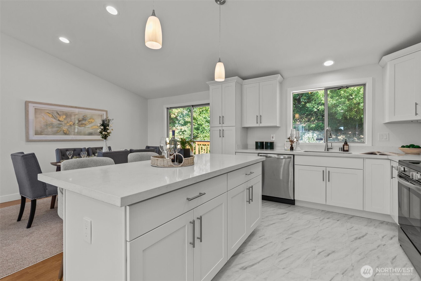 11822 56th Place South Seattle, WA 98178 - Photo 8 of 39 a kitchen with white cabinets and white appliances