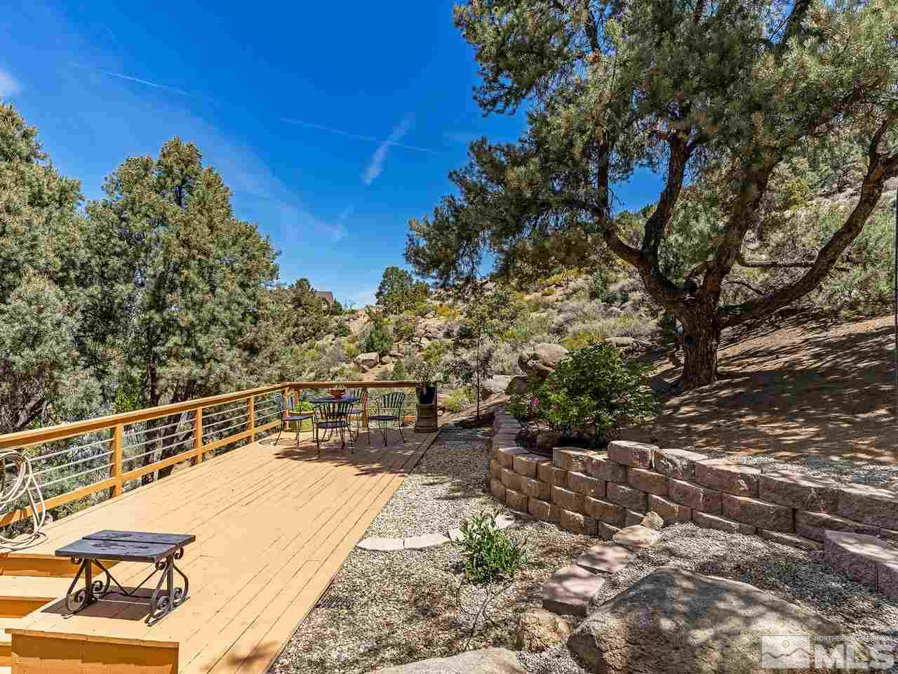 14748 Pine Knolls Lane Reno, NV 89521 - Photo 13 of 33 a view of a swimming pool with a patio