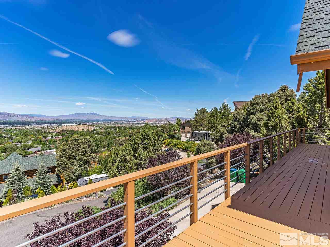 14748 Pine Knolls Lane Reno, NV 89521 - Photo 22 of 33 a view of a balcony with wooden floor