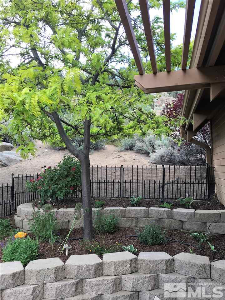 14748 Pine Knolls Lane Reno, NV 89521 - Photo 30 of 33 a front view of a house with a garden