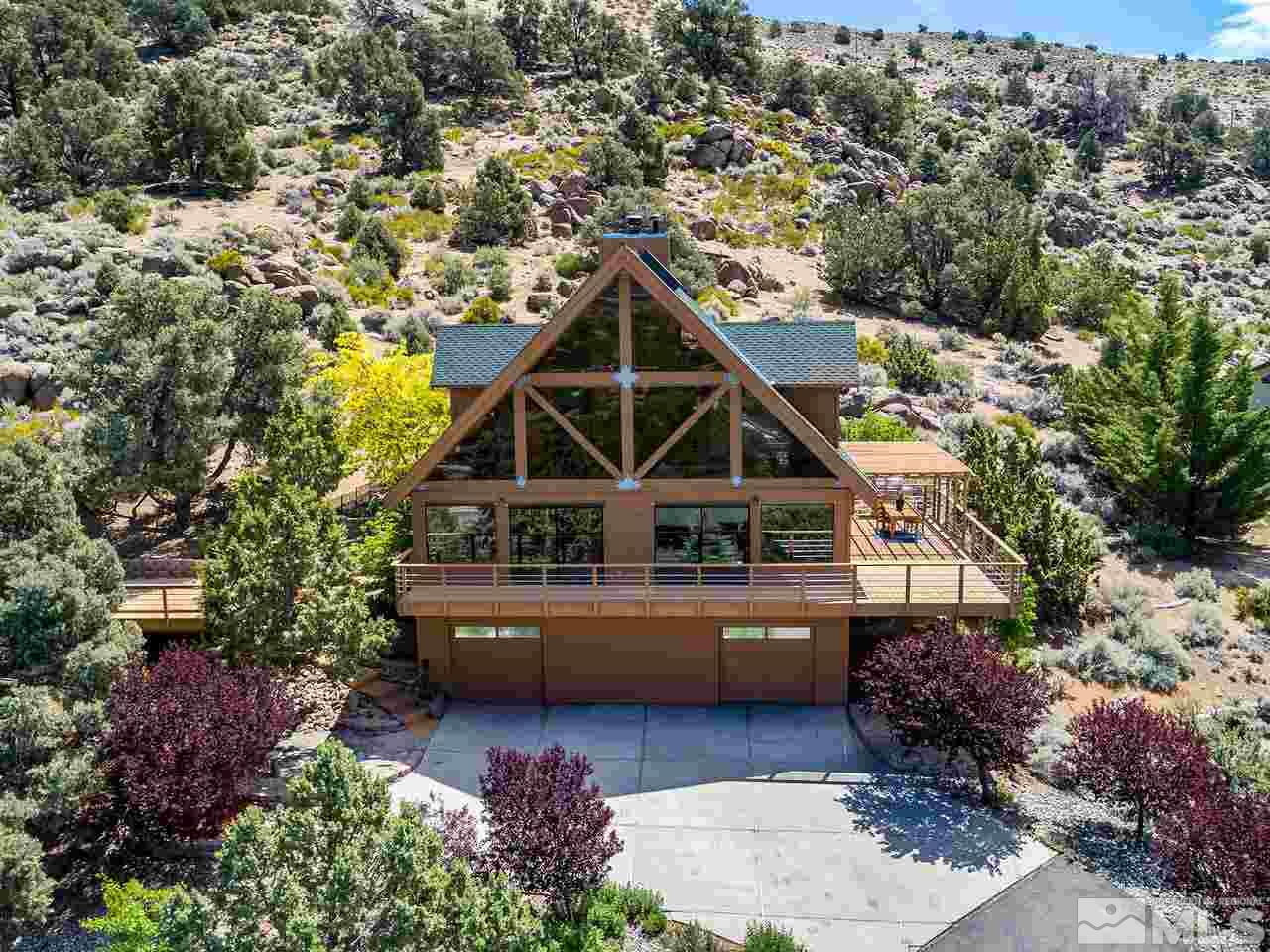 14748 Pine Knolls Lane Reno, NV 89521 - Photo 32 of 33 a front view of a house with a yard