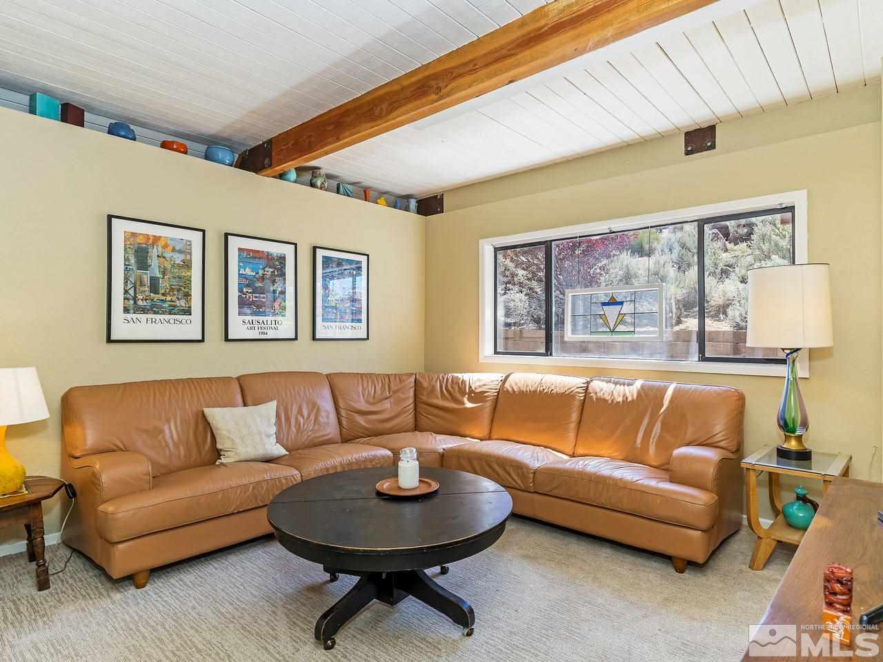 14748 Pine Knolls Lane Reno, NV 89521 - Photo 5 of 33 a living room with furniture and a large window