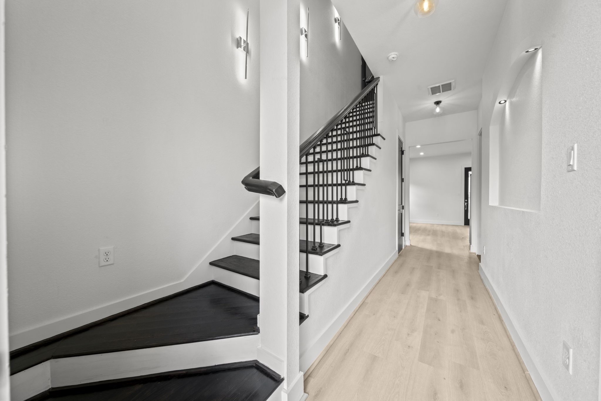 4930 Chennault Road, Unit A Houston, TX 77033 - Photo 2 of 16 a view of entryway with wooden floor