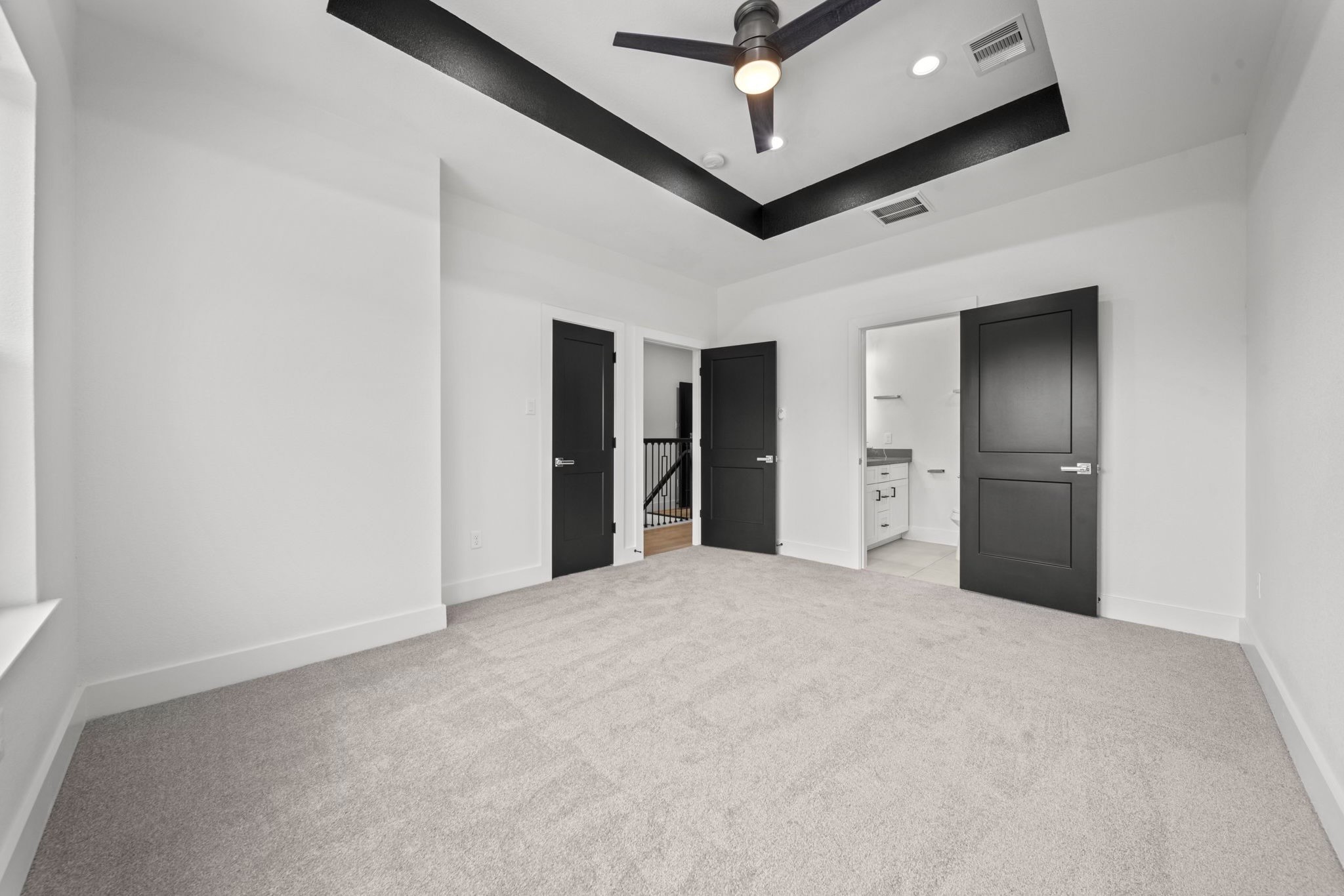 4930 Chennault Road, Unit A Houston, TX 77033 - Photo 8 of 16 a big room with closet and a ceiling fan