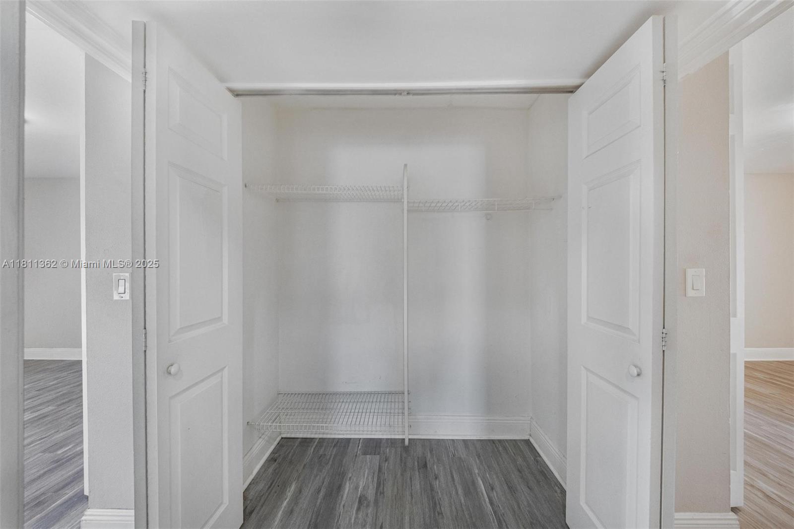 7019 Northwest 63rd Street Tamarac, FL 33321 - Photo 9 of 33 a view of a room with wooden floor