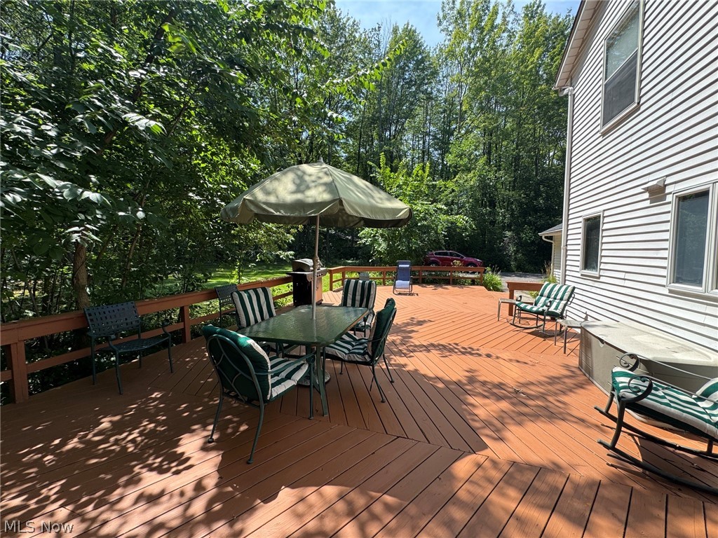 8201 Orchard Road Painesville, OH 44077 - Photo 41 of 45 Expansive wood deck with plenty of room to roam